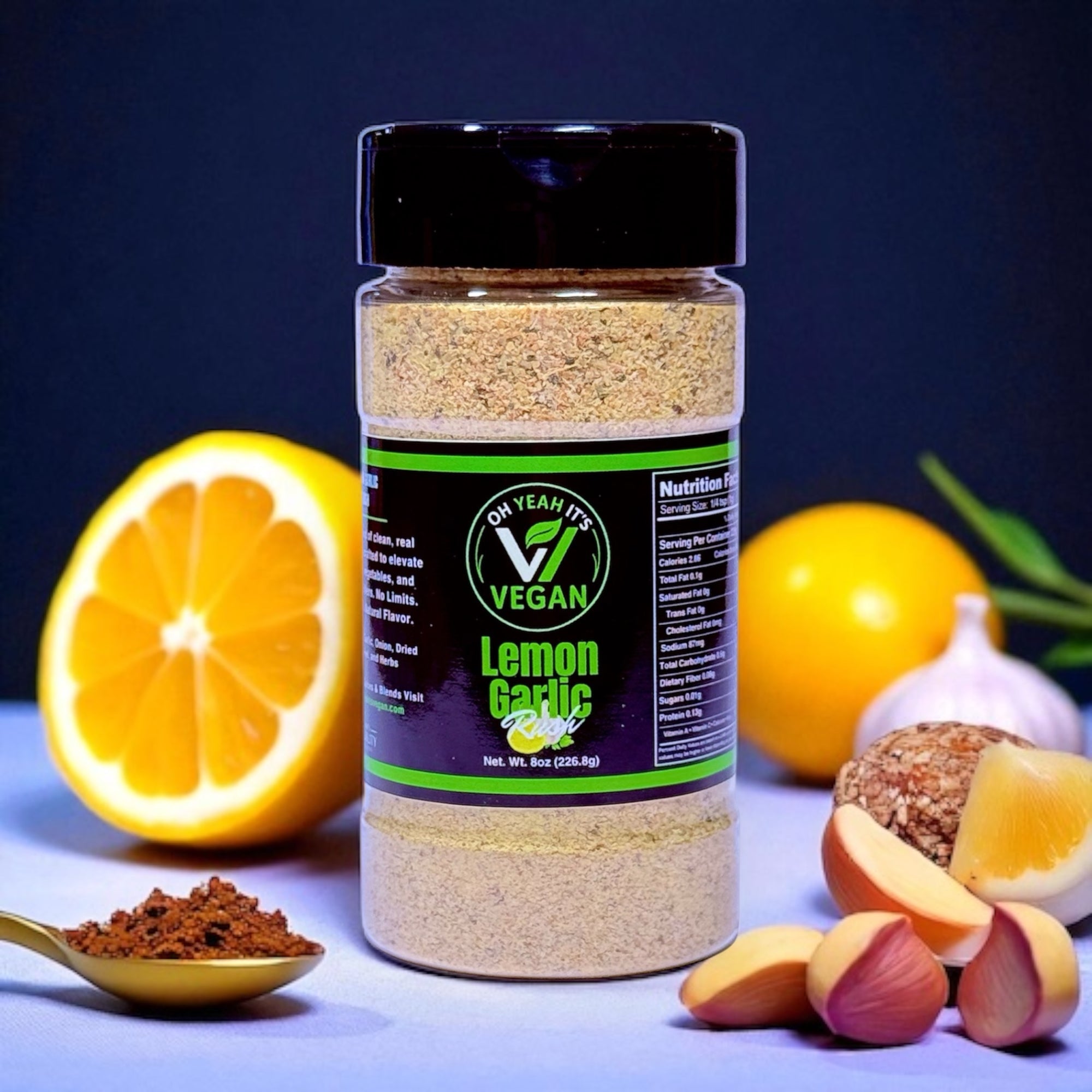 Oh Yeah It’s Vegan® Lemon Garlic Rush seasoning in clear bottle with bold label
