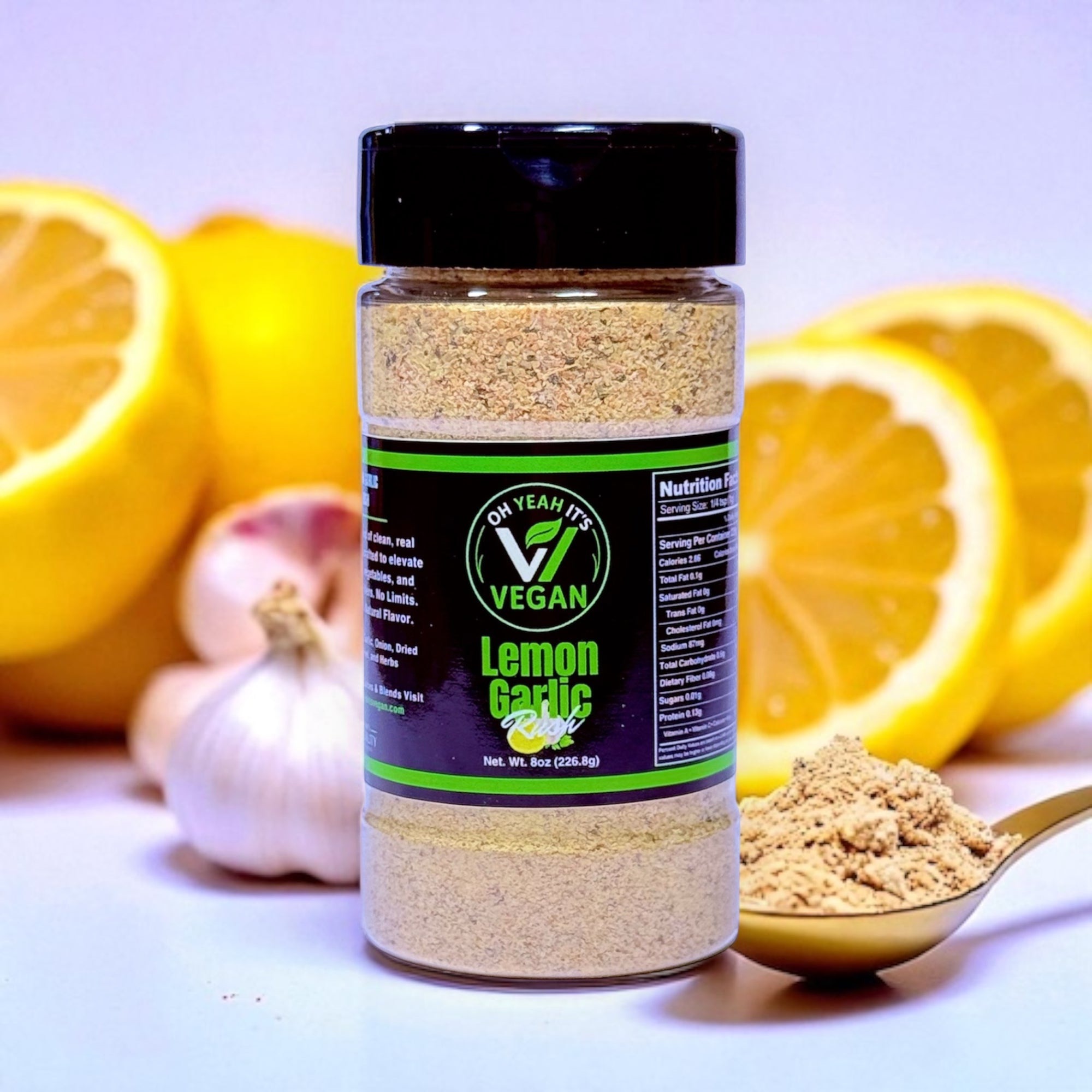 Oh Yeah It’s Vegan® Lemon Garlic Rush seasoning in clear bottle with bold label
